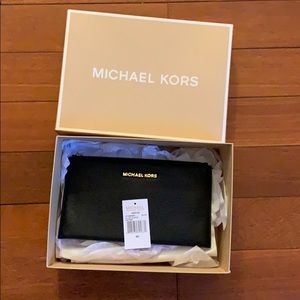 Michael Kors black large leather clutch new w. Box